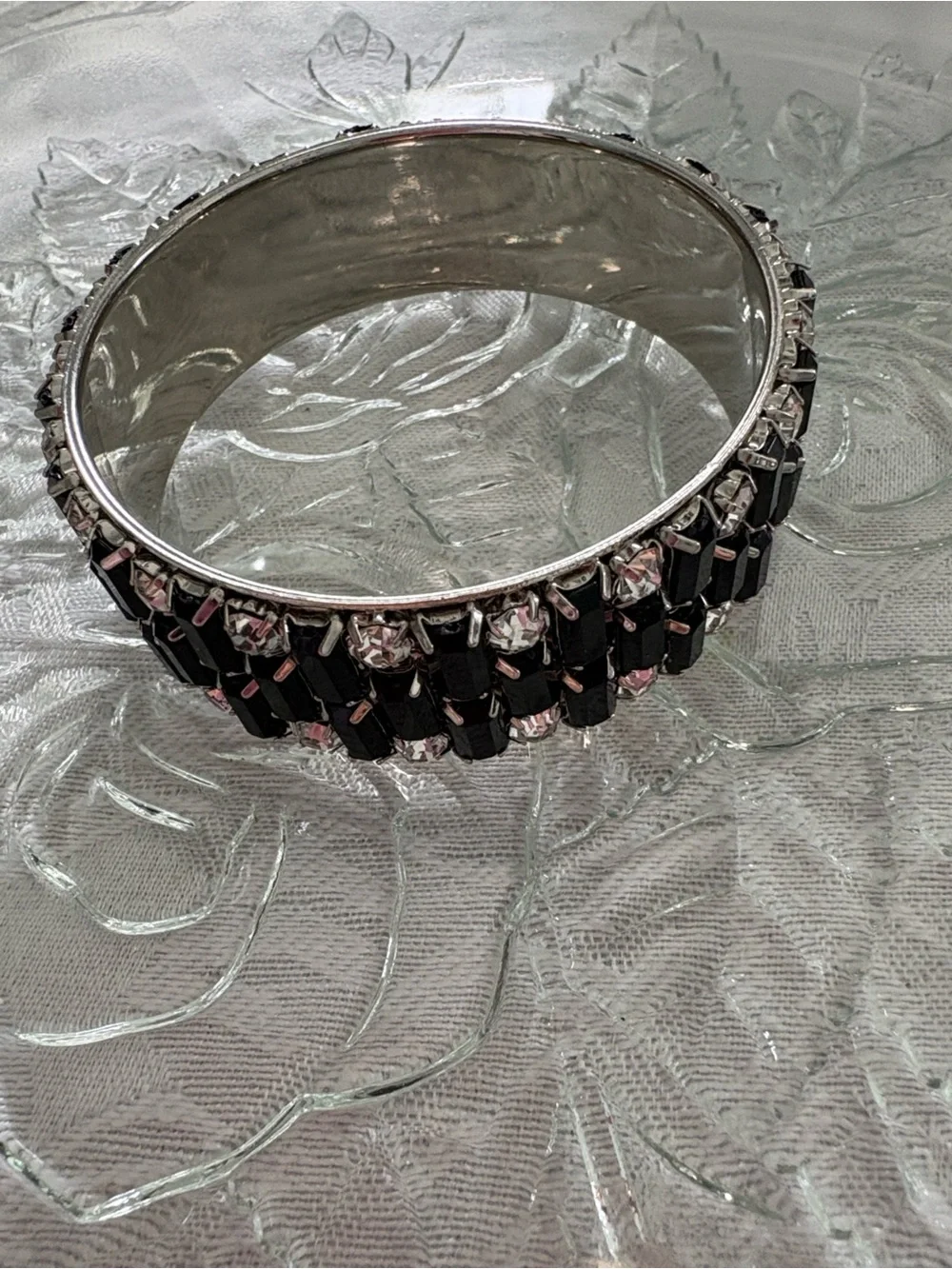 Elegant Silver Bangle Bracelet with Black and Clear Rhinestones.